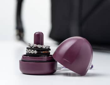 purple ring holder with rounded screw off top