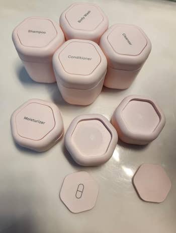 reviewer's hexagon-shaped pink containers