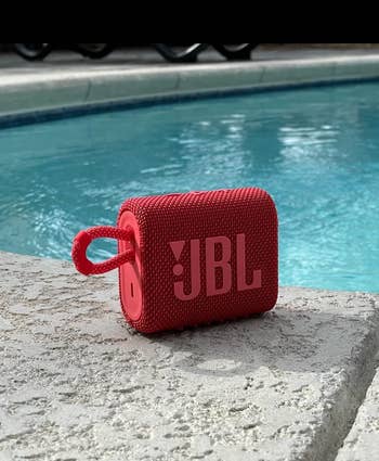 Portable JBL talker  resting connected  excavation  edge