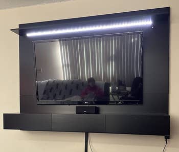 Reviewer image of the black TV stand