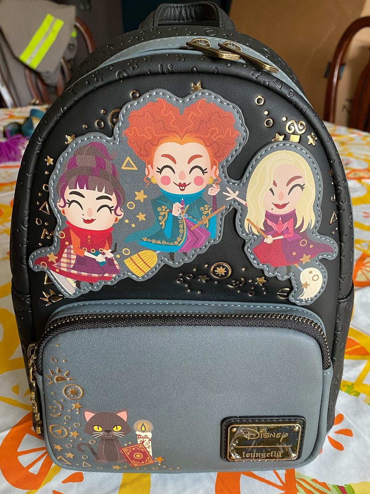 Backpack featuring cartoon witches from 