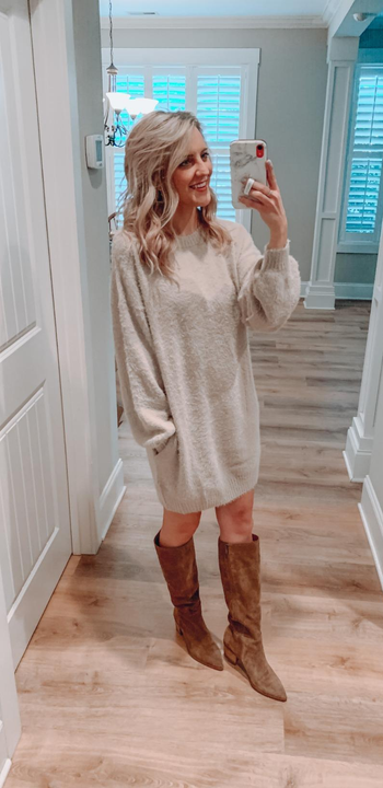 reviewer mirror selfie wearing the dress in beige