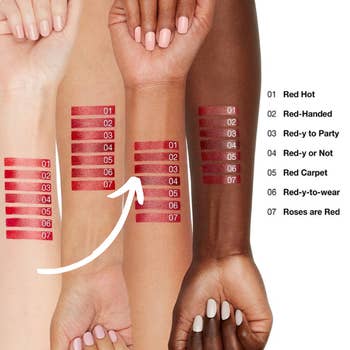 Four forearms with seven swatches of red lipstick