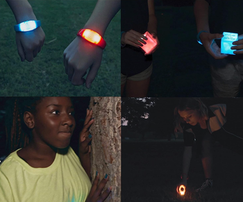 glowing wristbands on people playing the game
