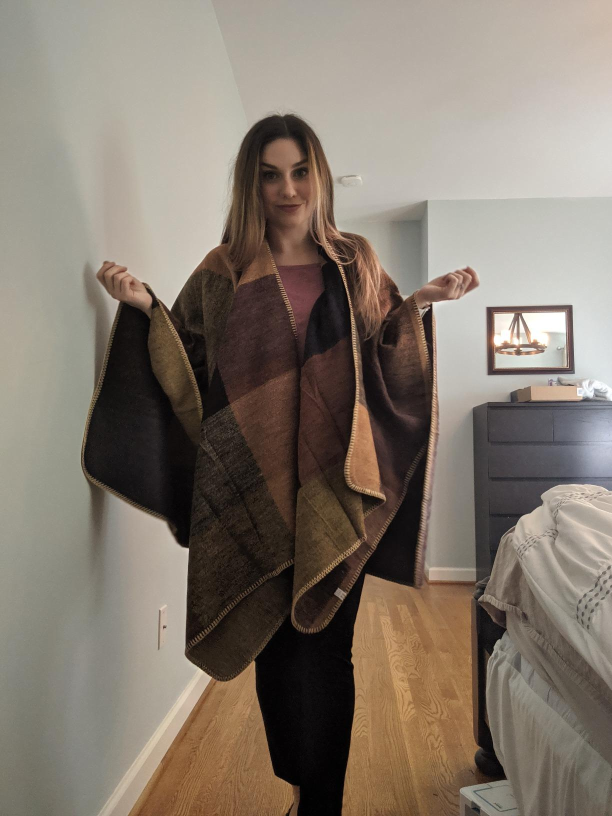 a reviewer wearing the shawl 