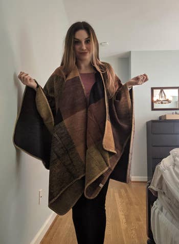 a reviewer wearing the shawl 