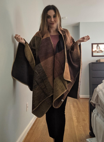 a reviewer wearing the shawl 
