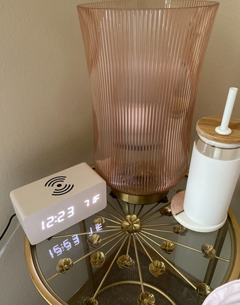 reviewer image of alarm clock on nightstand