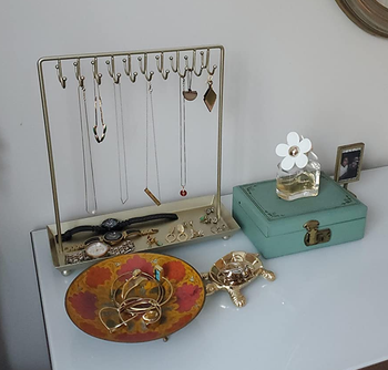 reviewer photo of necklace stand on dresser