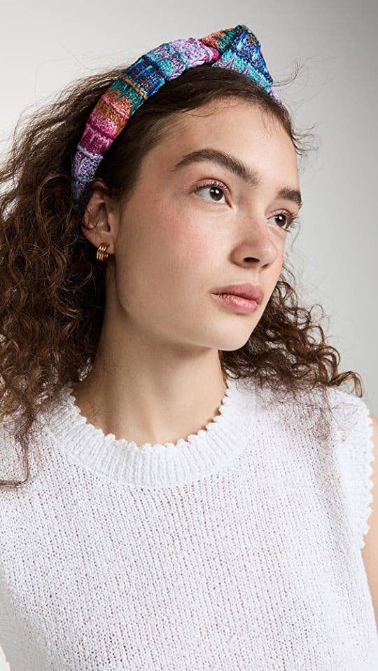 model in colorful knotted headband