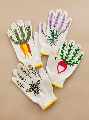 four different gardening gloves with different plants on them