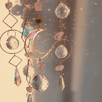 gif of the four sun catchers glimmering in the sun