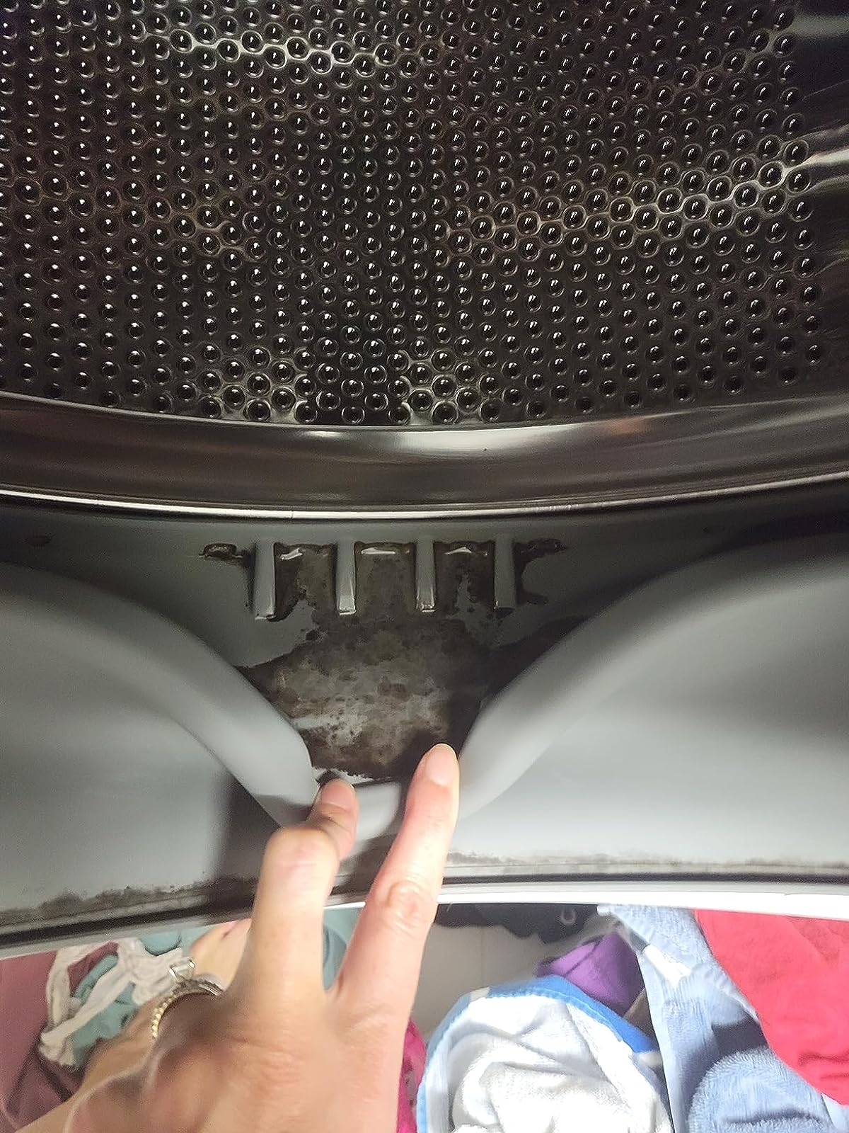 before photo of black staining on a reviewer's washing machine gasket