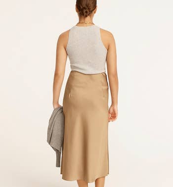 the same model showing the back of the skirt