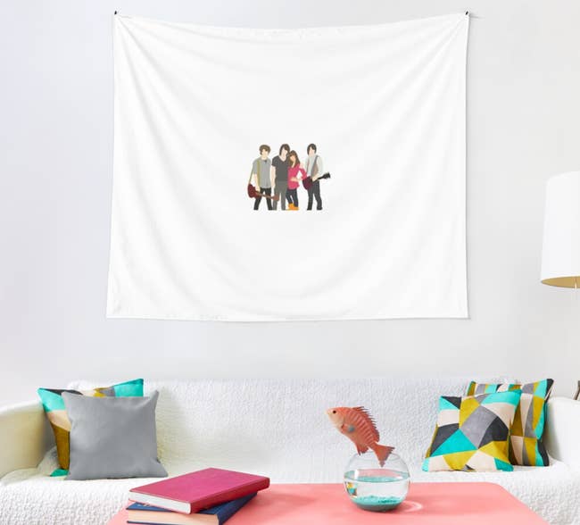 white tapestry with an illustration of nate, shane, mitchie, and jason from camp rock