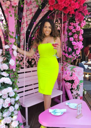 reviewer wearing dress in yellow while at brunch