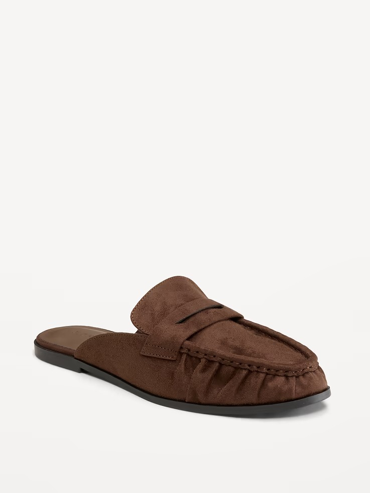 A brownish  suede slip-on loafer with a rounded toe, designed for casual wear
