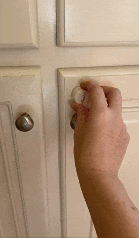 gif of reviewer showing how to use magnet to open the locked cabinet, then showing how it is securely locked