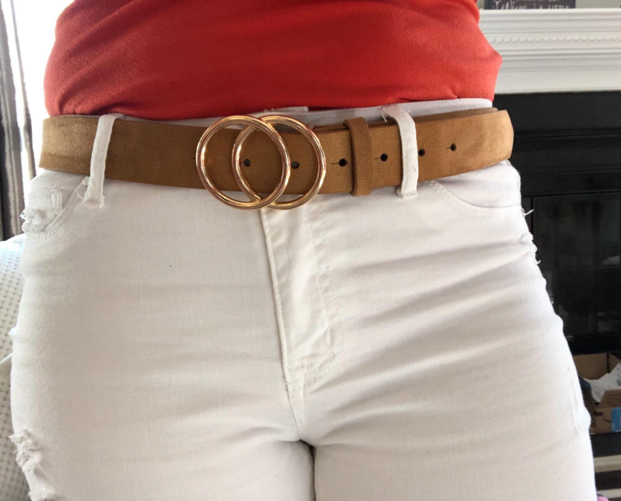 Reviewer photo of the brown leather belt with gold buckle