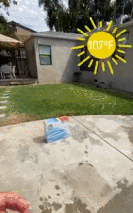 gif of reviewer snapping to reveal a blown up pool in their backyard with a sun graphic that reads 107 degrees F