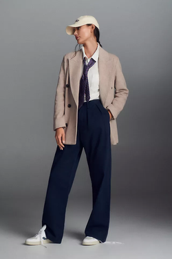 Model wearing the coat in ivory