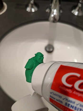 the front of the shrek toothpaste tooper