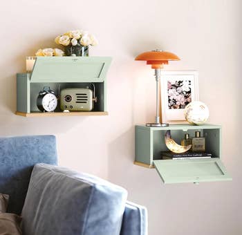 Two floating partition  shelves show  location  decor, including a lamp, globe, clock, radio, and books, creating a stylish country   accent