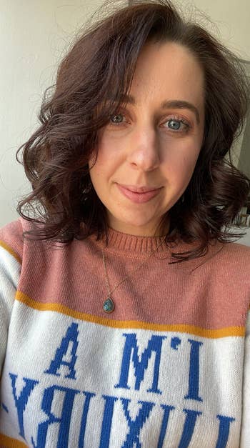 writer showing what her short hair looks like after using the Airwrap