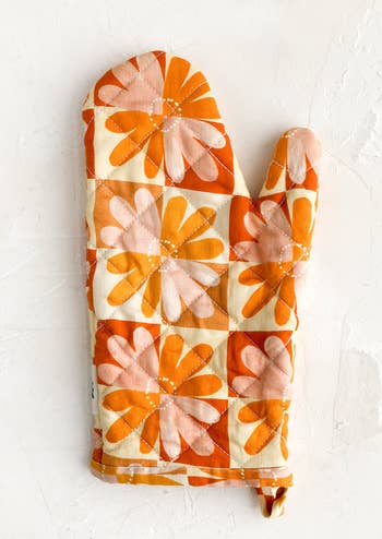 orange and red floral oven mitt