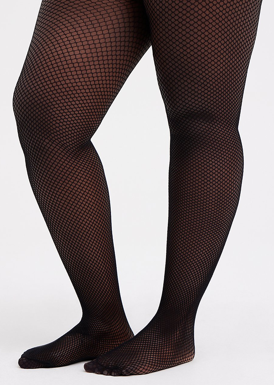 Image of model wearing black fishnet tights