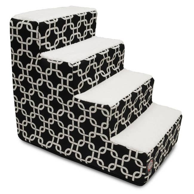 Black and white fabric foam four step stairs with geometric design on the side