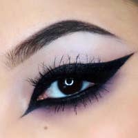 a closeup of someone wearing the eyeliner