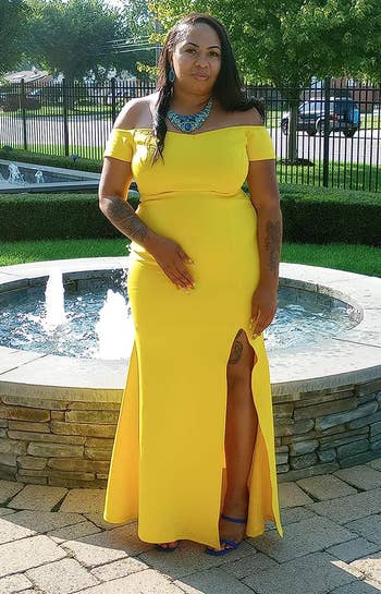 reviewer in the long yellow dress