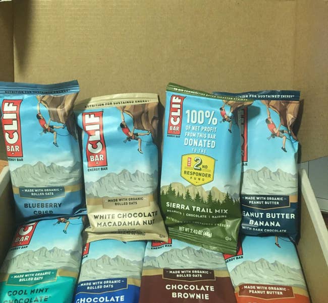 reviewer's box of bars including cool mint chocolate, crunchy peanut butter, sierra trail mix, and chocolate brownie