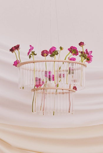 chandelier with pink flowers inside 