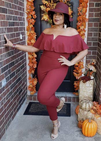 reviewer wearing the burgundy jumpsuit