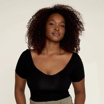 model wearing the black tee