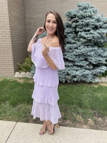 reviewer wearing the formal  successful  purple