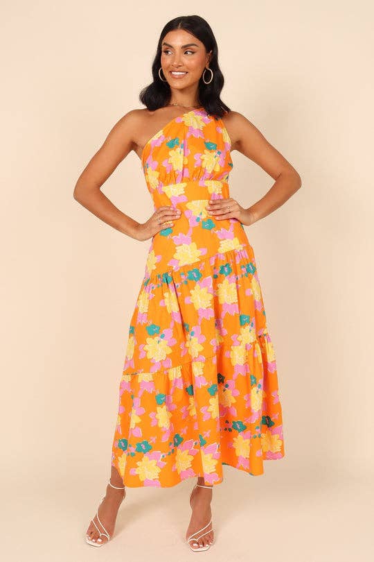 model in orange midi dress with tiers and pink yellow and teal flowers