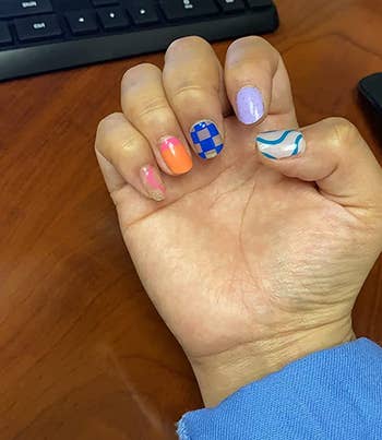 close-up of another reviewer's abstract nails