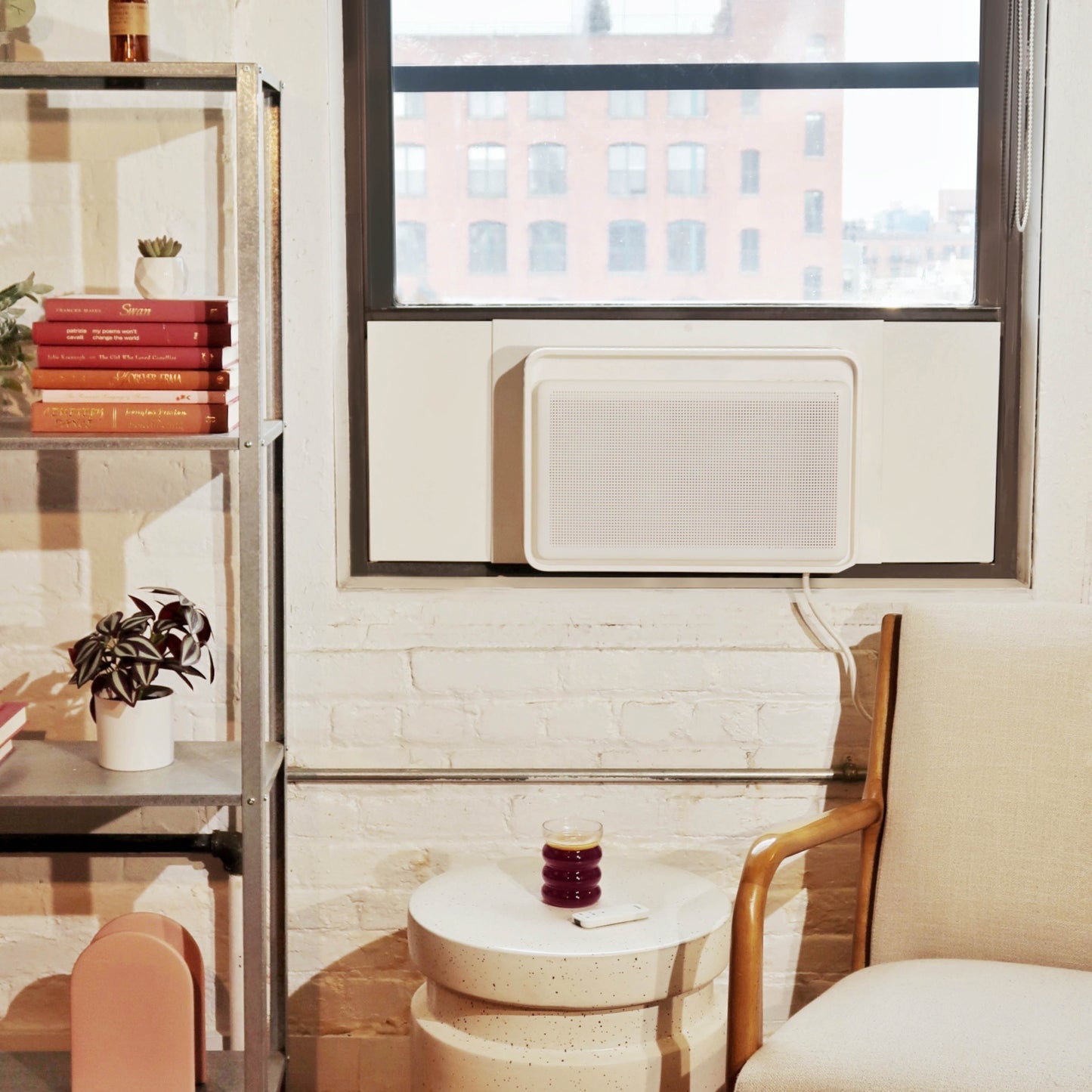 white AC unit in a window