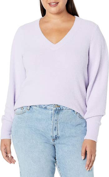 model wearing the lavender sweater with jeans
