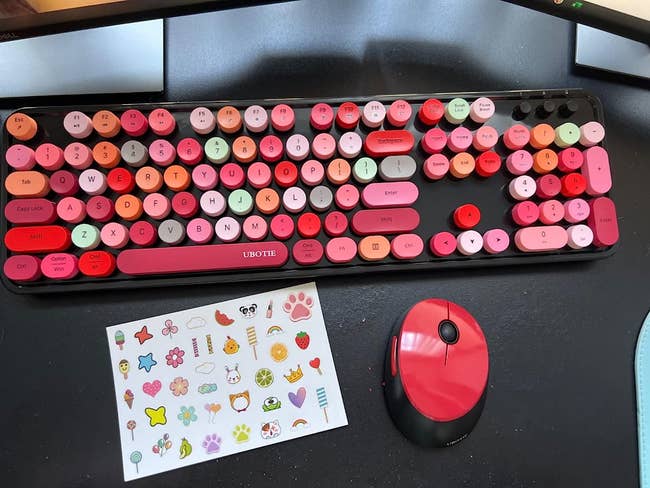 the red and pink mechanical keyboard and mouse