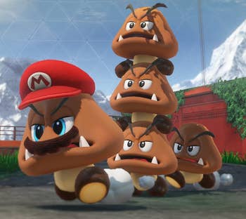 screenshot of goombas, one of which is wearing a mario hat