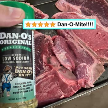 Hand holding Dan-O's Original seasoning near raw steak with a graphic of five stars and text 