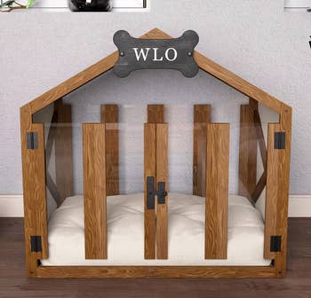 the wooden gabled dog house