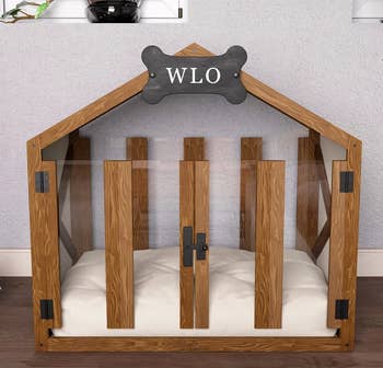 the wooden gabled dog house