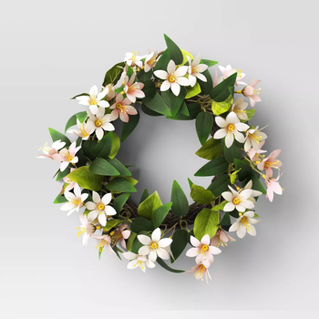 a wreath with flowers in it