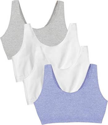  1  grey, 1  white, and 1  airy  blue. They are sleeveless with scoop necks, perfect  for casual wear