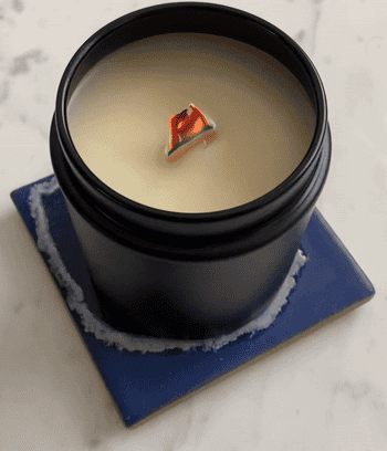 gif of the lit candle with the flame flickering